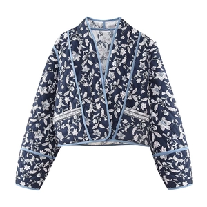 Navy floral quilted jacket with white botanical prints and open front design