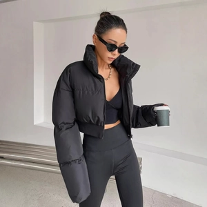 Women's black cropped puffer jacket with high collar and insulated quilted finish