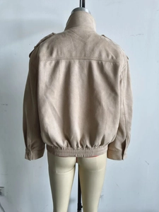 Back view of a beige suede jacket featuring a stand collar and elastic hem for a loose fit