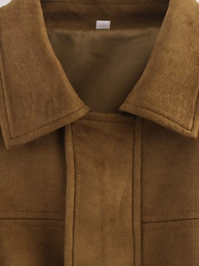 Close-up of brown suede bomber jacket collar with double-stitch detail and soft lining