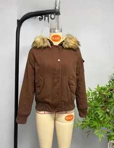 Close-up of brown hooded jacket with detachable faux fur collar and ribbed cuffs for women