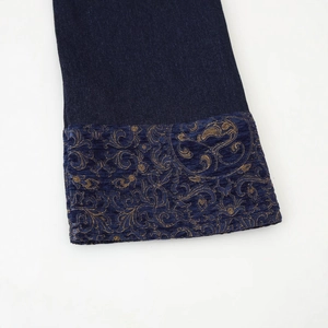 Deep blue denim kimono jacket with golden baroque jacquard pattern on cuffs and sleeves