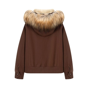 Detail view of winter jacket featuring a large faux fur collar and warm fleece hood lining