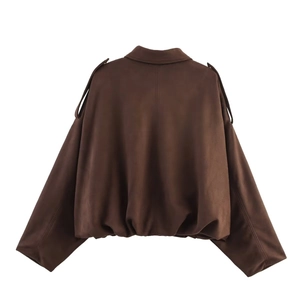 Back view of a deep brown faux suede bomber jacket featuring drop shoulders and elastic hem