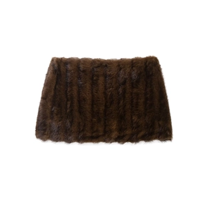 Detailed texture of dark brown faux fur vest with vertical stripes on white background