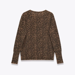 Women's leopard print knit sweater featuring a crew neck and ribbed cuffs on white background