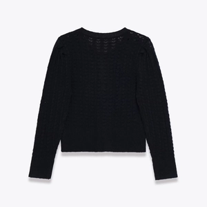 Back view of black long sleeve knit sweater with hollow wave texture and round neck