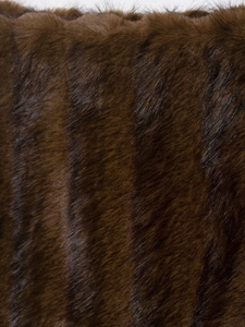 Close-up of deep brown faux fur texture with dense fibers and rich soft texture