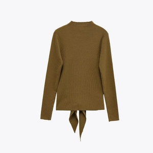 Olive green long sleeve slim fit knit top with back bow tie detail on white background
