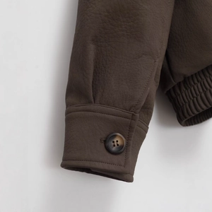 Women's dark brown faux leather jacket with detachable collar and ribbed cuffs