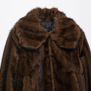 Women's dark brown faux fur jacket featuring a stylish lapel and premium satin lining