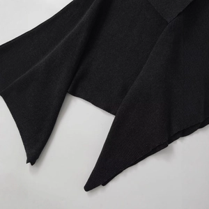 Women's black asymmetric knit cape sweater with vertical ribbed texture and fine stitching