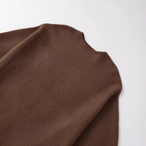 Women's loose casual round neck knitted poncho sweater in deep brown minimalist style