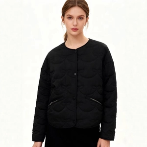 Quilted black jacket for women with bow stitch pattern and front button closure