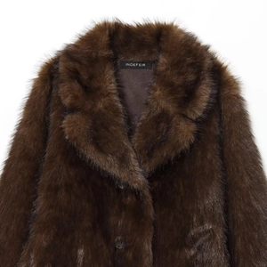 Women's dark brown faux fur jacket featuring a large lapel and thick textured plush finish