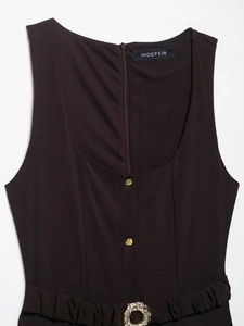 Detail of burgundy midi dress featuring gold buttons and retro waist belt buckle