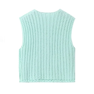 Detailed macro view of mint green ribbed texture on this chunky knit vest top