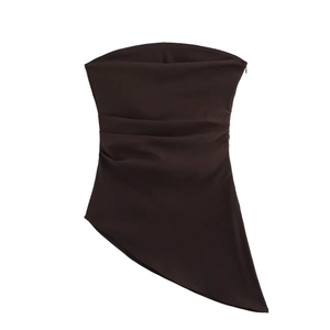 Detail view of dark brown strapless top with ruched fabric and asymmetric hemline