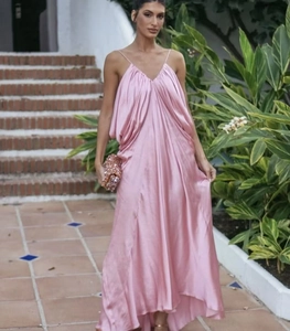 Detailed view of the pink satin slip dress featuring elegant draped neckline and thin straps