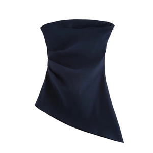 Detail of navy blue strapless tube top with asymmetrical hem and pleated draping fabric