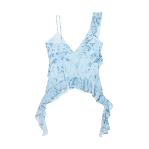 Detail of light blue floral mesh top with layered ruffles and asymmetric design