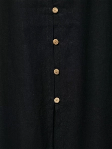 Detail of dark linen fabric texture with gold metallic buttons on elegant midi dress