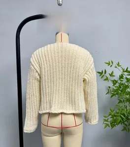 Detail of off-white chunky knit vest with vertical stripe texture on mannequin