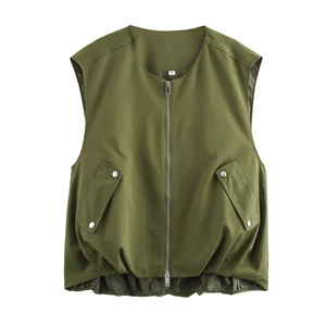 Detail of olive green sleeveless vest featuring a front zipper and large flap pockets