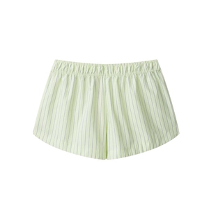 Detail of light green vertical striped cotton shorts with elasticated waistband detail
