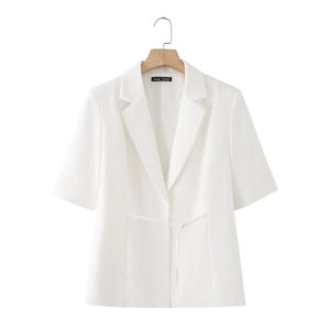 White short-sleeved blazer with notched lapels and waist tie design on a wooden hanger