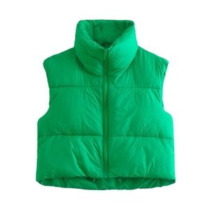 Detail of bright green stand collar vest with horizontal quilting and drawstring hem