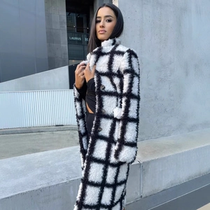 Long black and white plaid plush coat for women in oversized winter streetwear style