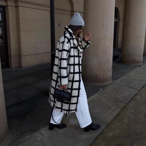 Long monochrome checkered faux fur coat with oversized lapels in a classic straight cut