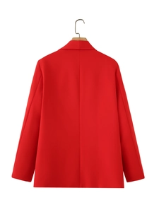 Close-up of vibrant red shawl collar blazer back showing central seam and straight hemline