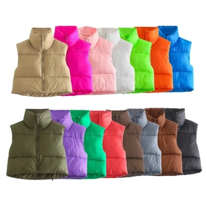 Women's padded puffer vest with stand collar available in various vibrant colors