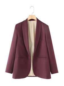 Detail view of burgundy shawl collar blazer with smooth lining and premium stitching