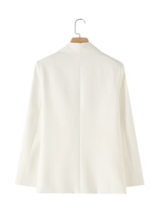 Back view of a white shawl collar blazer showing tailored seams and clean shoulder lines