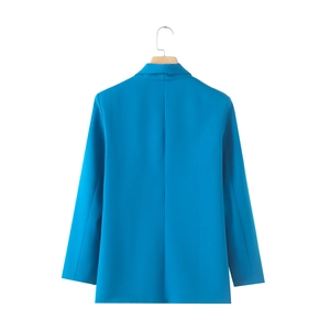 Back view of a bright blue women's blazer with a minimalist lapel and clean shoulder line