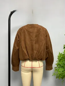 Rear view of a dark brown suede-like bomber jacket with drop shoulders and hem detailing