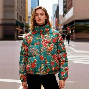 Women's dark green quilted puffer jacket with vibrant red and yellow floral prints