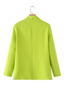 Back view of a lime green shawl collar blazer showing straight seams and neat hem finish