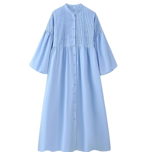 Light blue long sleeve dress with button-up front and pleated puff sleeves detail