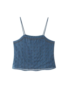 Detail of dark blue camisole with delicate beading and vertical pleated texture