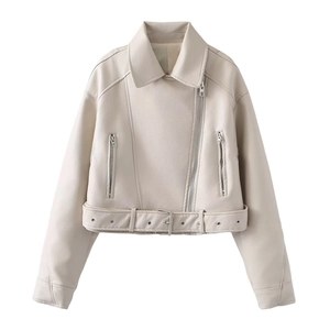 Detail of light beige faux leather biker jacket featuring silver zippers and waist belt