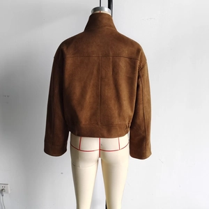 Detail of brown faux suede jacket back with stand collar and vertical seam design