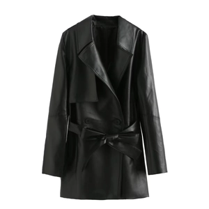 Detailed view of black faux leather trench coat with waist belt and classic lapels