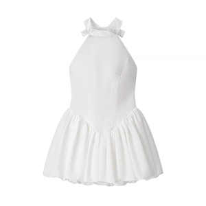 White halter neck mini dress with delicate side bows and a voluminous puff hemline skirt