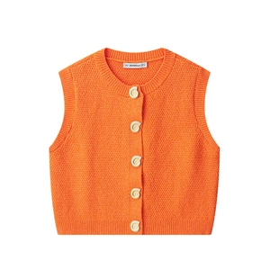 Bright orange knit vest with snail shell buttons and ribbed edges in a cropped fit