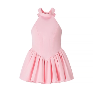 Sleeveless halter neck puff dress in soft pink with bow tie detail and pleated hem