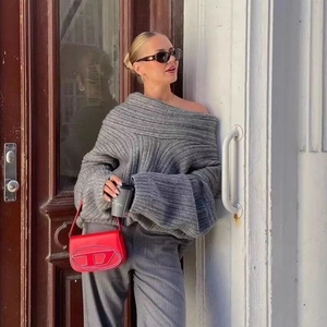 Chic off-the-shoulder grey oversized knit sweater with a cozy minimalist style for women